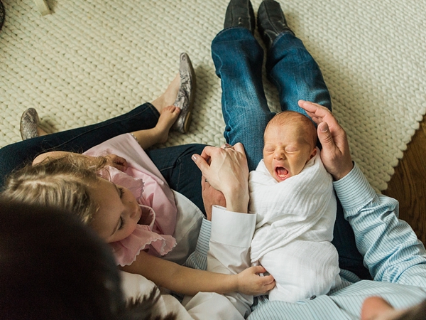 Beautiful family photo taken during a lifestyle newborn session by j. photography